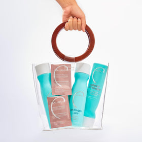 Malibu C bottle in bathroom setting showing easy salon-style use