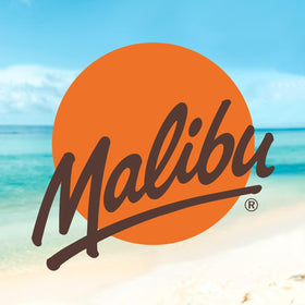 Malibu label close-up showing carrot extract and Vitamin E benefits