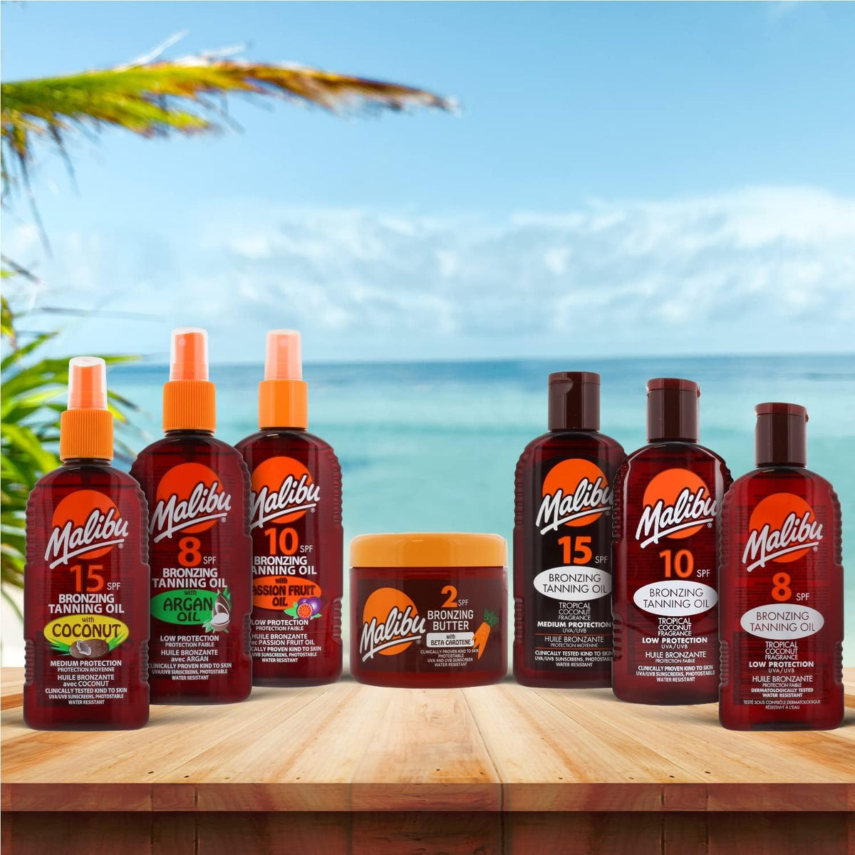 Malibu bottle on beach towel conjuring tropical scent and relaxed tanning