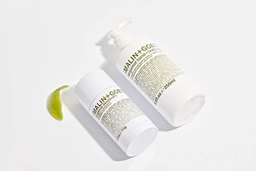 MALIN+GOETZ bottle styled on bathroom shelf for minimalist decor and easy access benefit