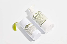 MALIN+GOETZ bottle styled on bathroom shelf for minimalist decor and easy access benefit