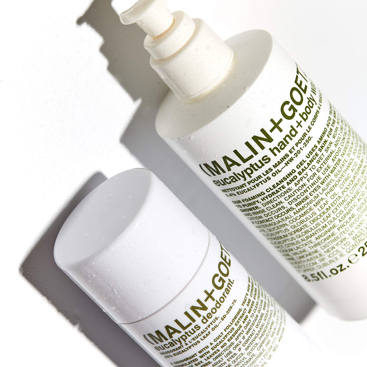 MALIN+GOETZ bottle styled on bathroom counter suggesting everyday luxury and convenience