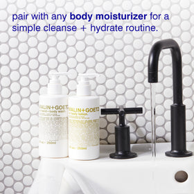 MALIN+GOETZ bottle in shower setting demonstrating dual-use for hands and body