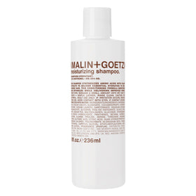 MALIN+GOETZ front bottle shot showing minimalist packaging and travel-friendly design