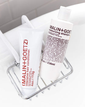 MALIN+GOETZ close-up of panthenol and surfactant ingredients highlighting repair benefit