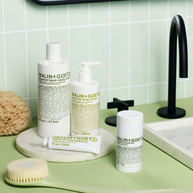 MALIN+GOETZ back label close-up with ingredients, transparent clean-formula benefit