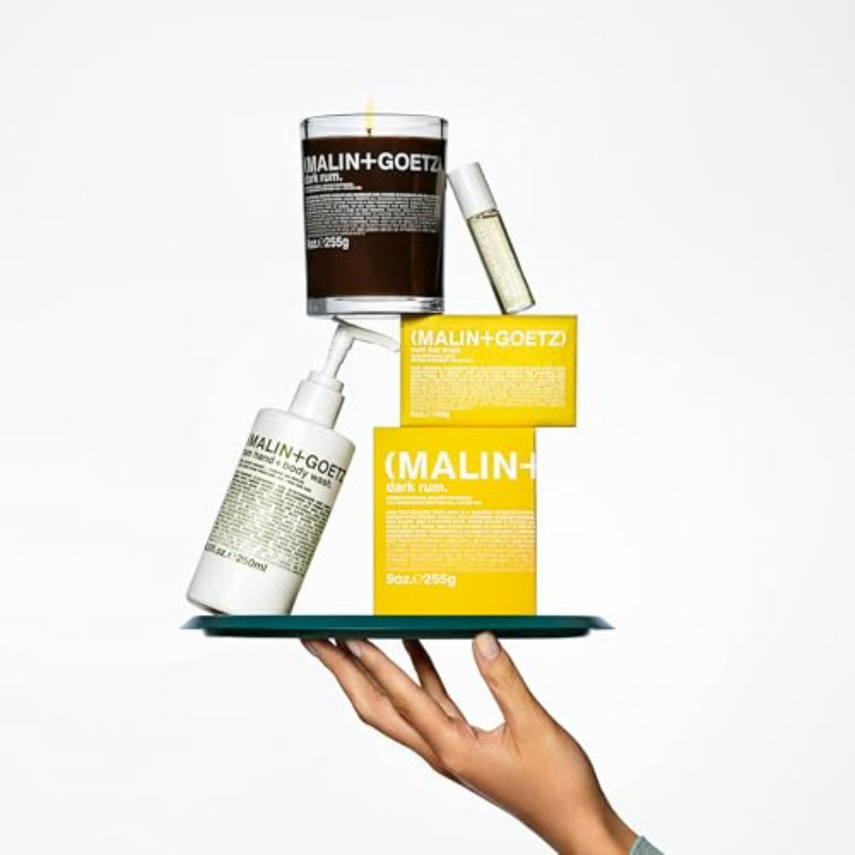 MALIN+GOETZ bottle on bathroom counter conveying minimalist, modern lifestyle appeal