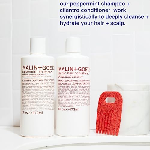 MALIN+GOETZ shampoo styled in bathroom setting conveying daily refresh ritual