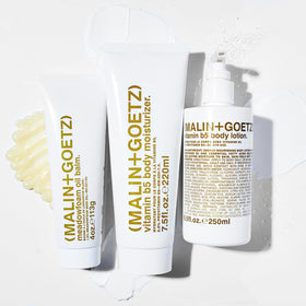 MALIN+GOETZ pump dispensing lotion onto arm, quick application and hydration benefit