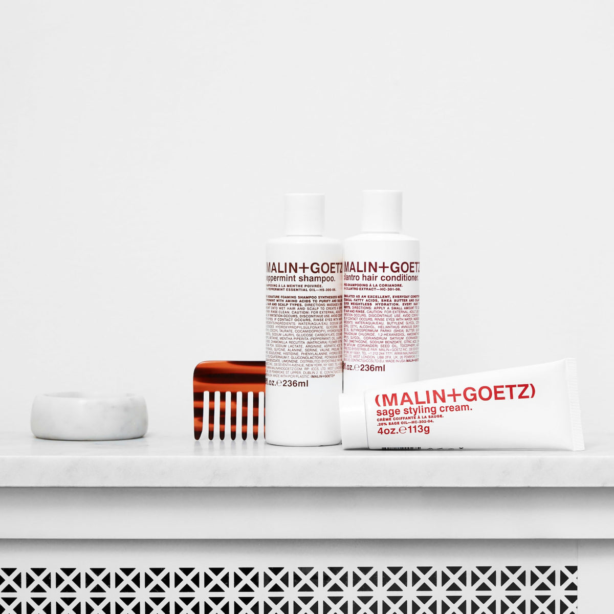 MALIN+GOETZ before and after hair image showing reduced frizz and added shine