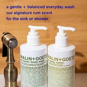 MALIN+GOETZ wash being applied on hands highlighting soft cleansing benefits