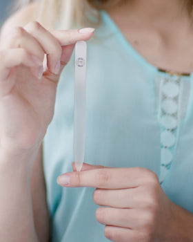 Malva Belle held in hand to show compact size and easy portability