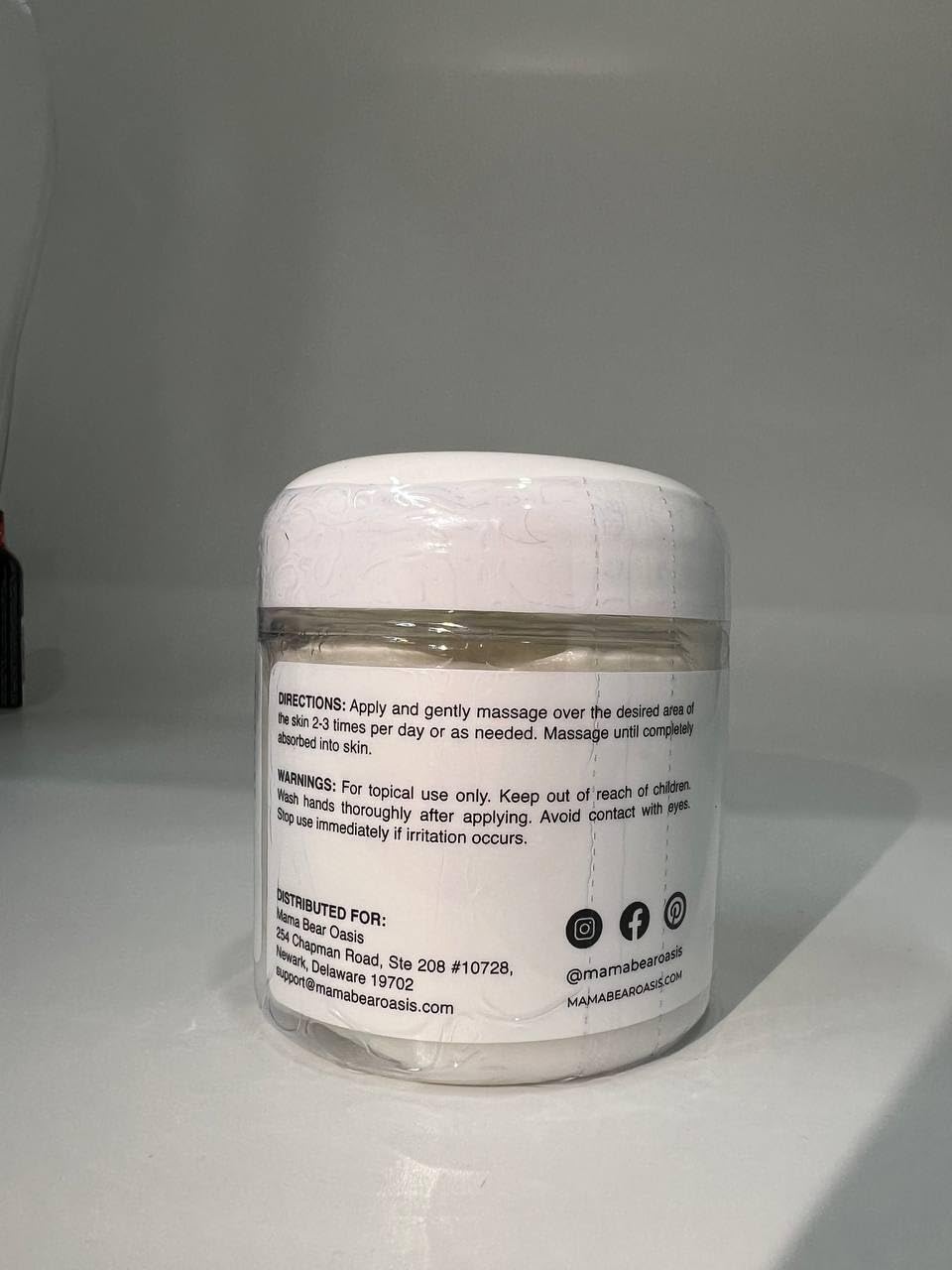 application of Mama Bear Oasis lotion on foot demonstrating easy use and lightweight feel