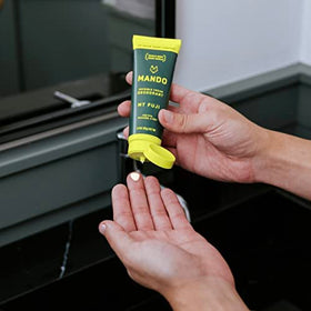 Mando tube in hand illustrating compact travel-friendly benefit
