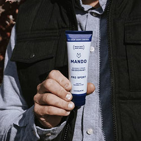 Mando in lifestyle shot applied to feet and groin for full-body odor control