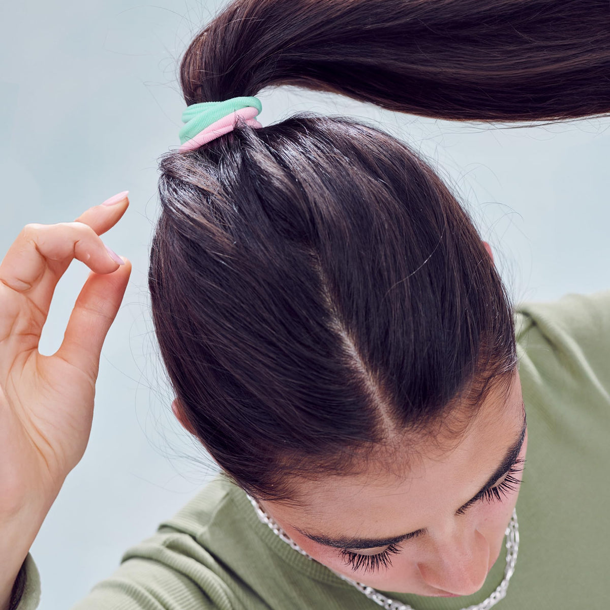 Mane hair ties holding a high ponytail securely during activity and styling