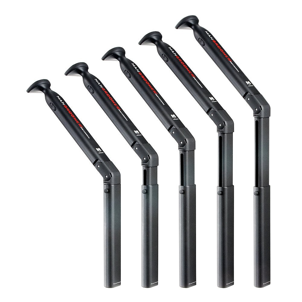 MANGROOMER held in hand to show size and ergonomic control
