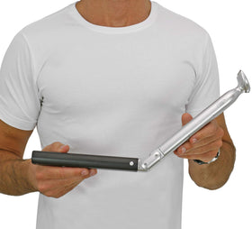 MANGROOMER size comparison with hand shows compact, travel-friendly design