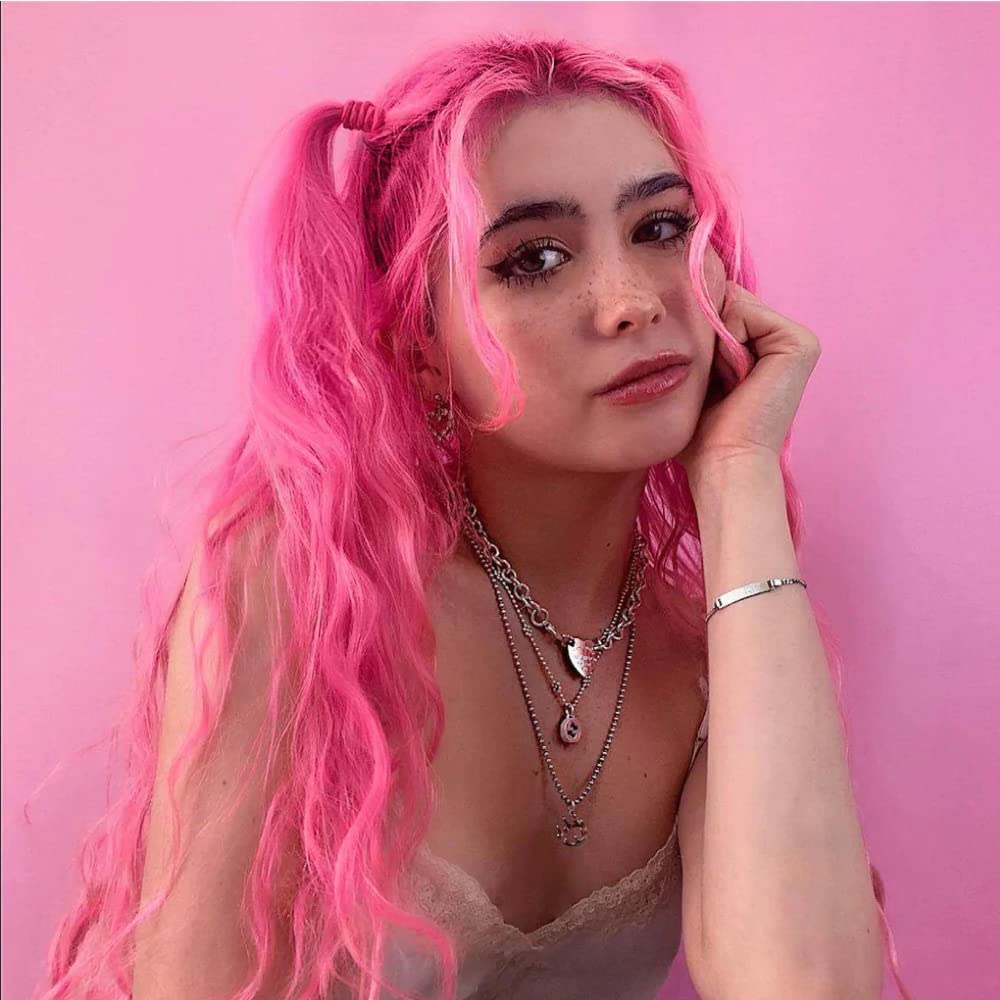 MANIC PANIC styled model outdoors showing wearable bright pink hair impact