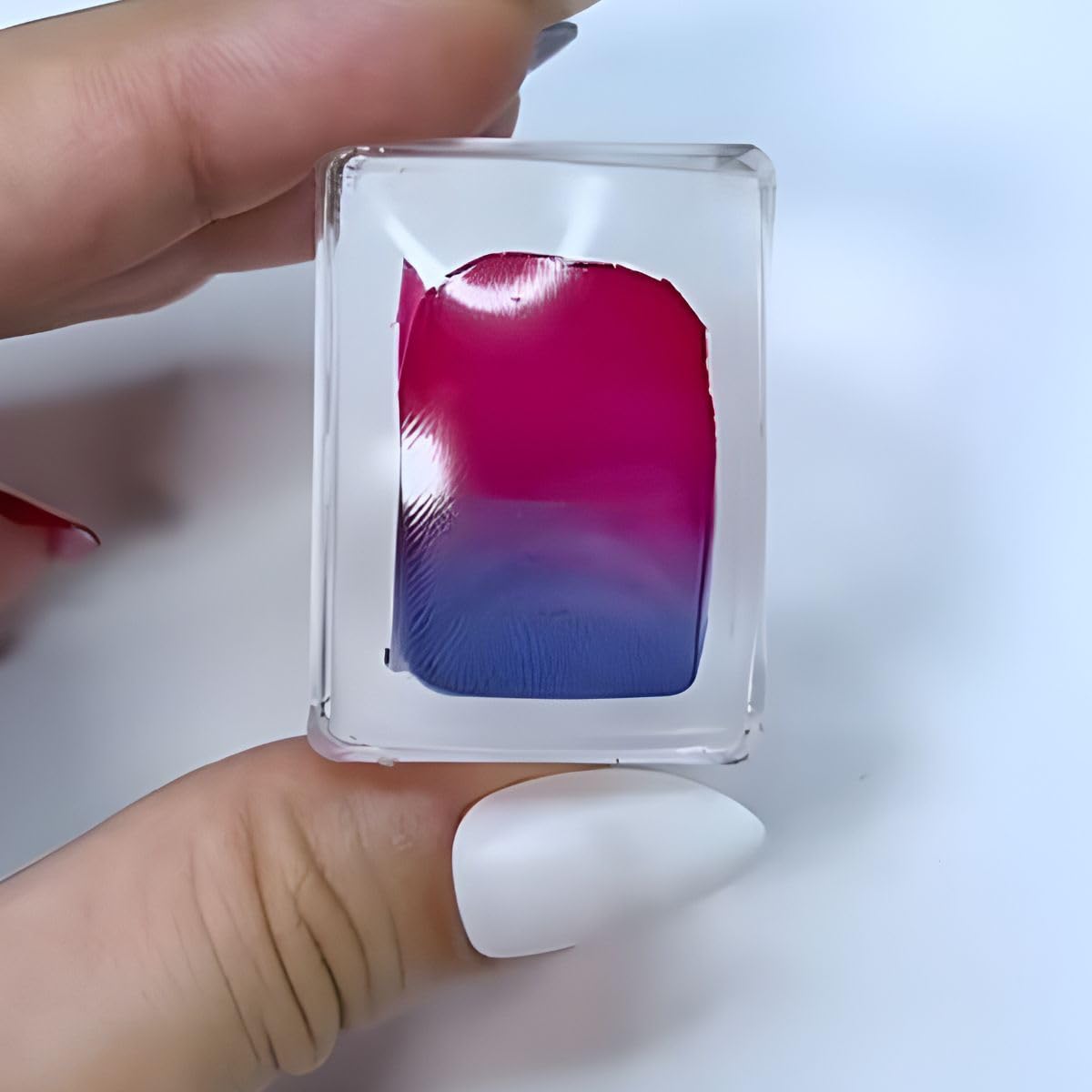 Maniology stamper held in hand demonstrating comfortable grip and control