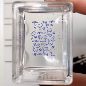 Maniology stamper picking up a design from a metal plate for accurate transfer