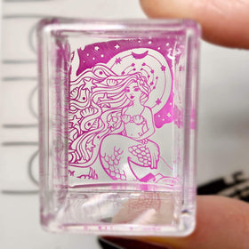 Maniology stamper next to ruler illustrating the 1 inch by 1.5 inch stamping area
