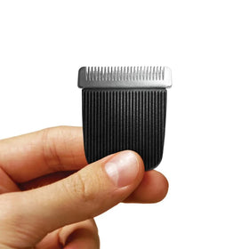 MANSCAPED ceramic blade being rinsed under water showing waterproof hygienic cleaning