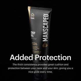 MANSCAPED 3.5 oz Crop Gel beside ruler to show compact travel-friendly size