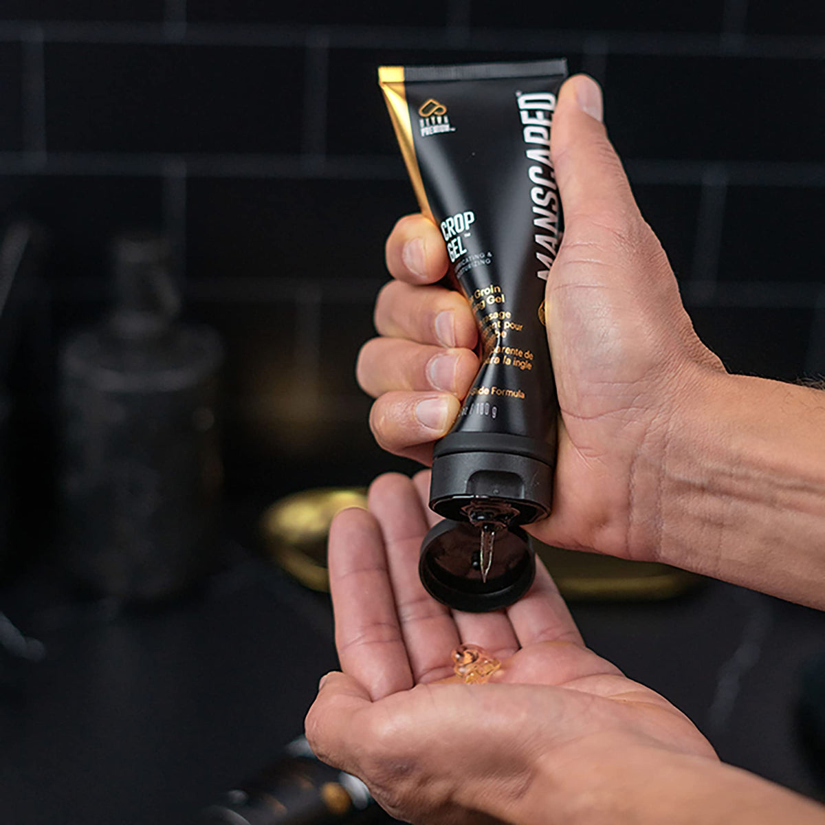 MANSCAPED gel rubbed on hand to show clear, non-foaming protective layer