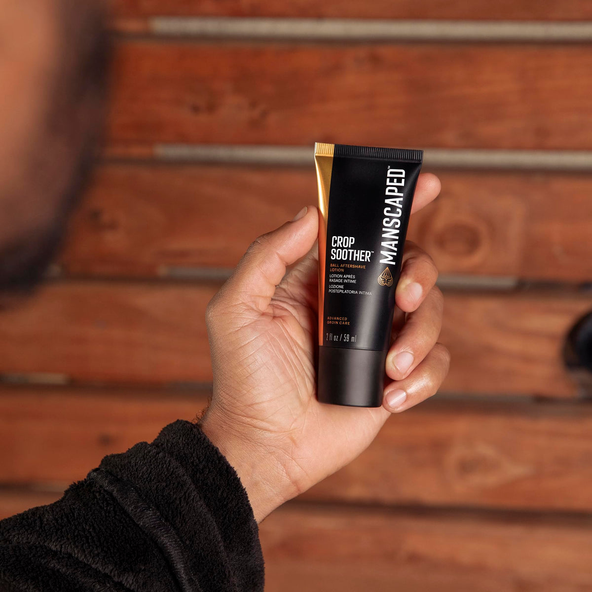MANSCAPED packed in a travel kit emphasizing portable post-shave relief