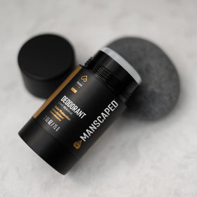 MANSCAPED ingredient label close-up showing aluminum-free, paraben-free formulation benefits