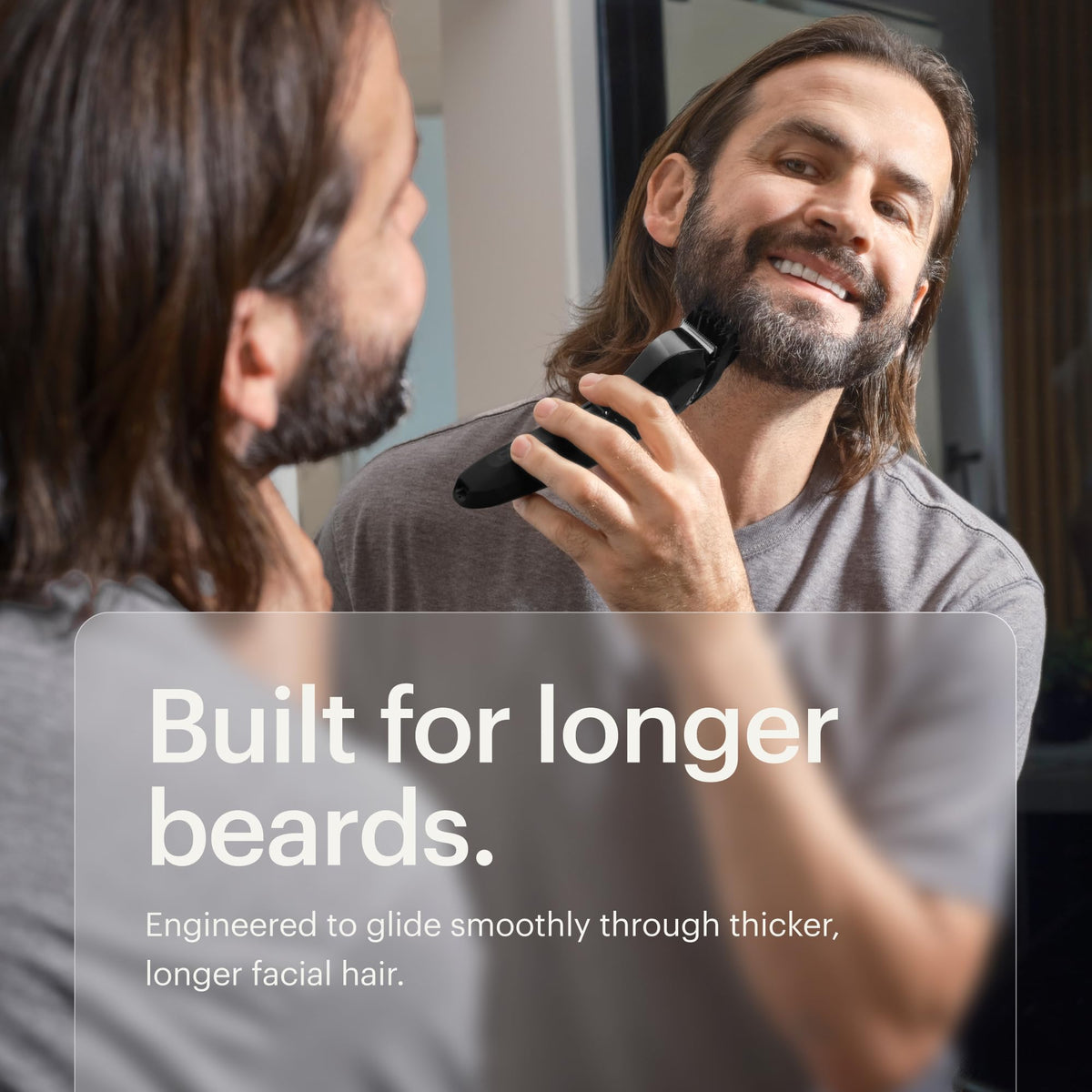 MANSCAPED flatlay of the comb and trimmer illustrating included accessory and setup