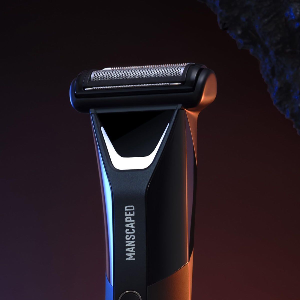 MANSCAPED hand pressing to remove foil demonstrating easy replacement benefit