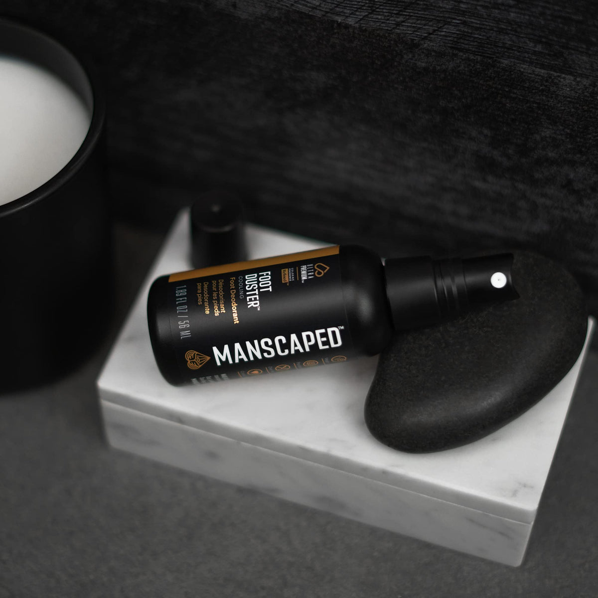 MANSCAPED applied to towel-dried feet after shower delivering instant refreshing relief
