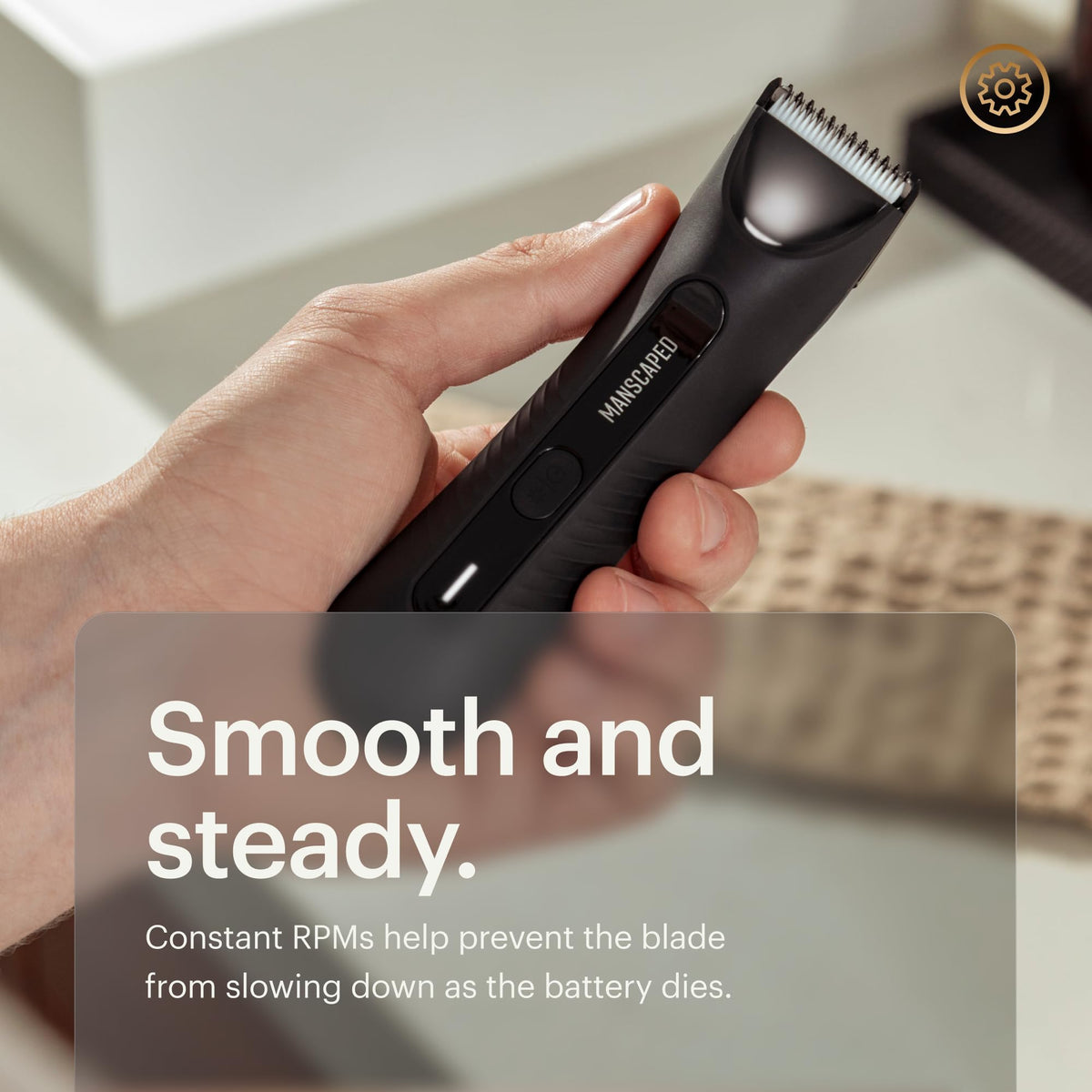 MANSCAPED handheld trimmer in palm showing compact size and handling benefit