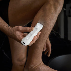 MANSCAPED USB‑C cable plugged into trimmer demonstrating fast, universal charging