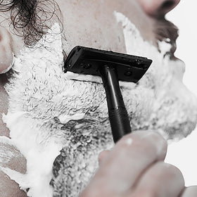 MANSCAPED lifestyle scene of shaving setup highlighting smooth results