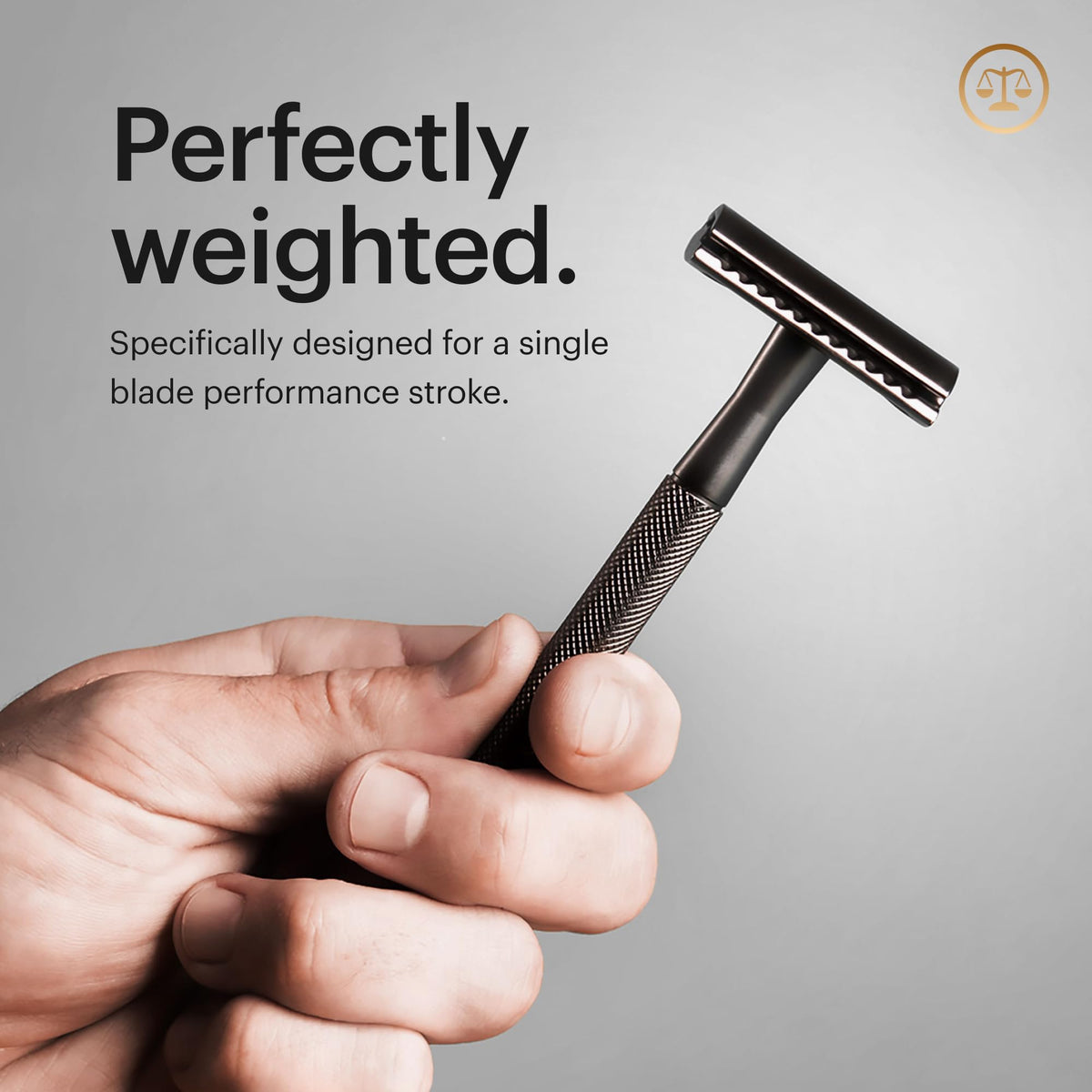 MANSCAPED razor held in hand demonstrating size and ergonomic advantage