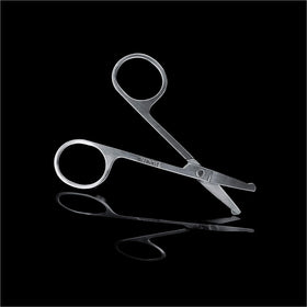 MANSCAPED medium-grit nail file texture close-up for smoothing edges and refined nails