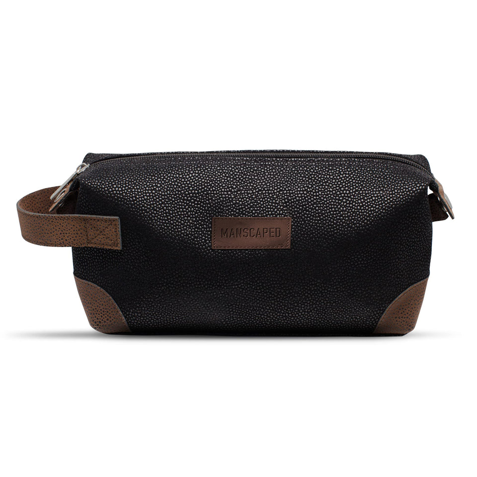 MANSCAPED front view of The Shed toiletry bag showing sleek PU leather finish and zipper for polished storage