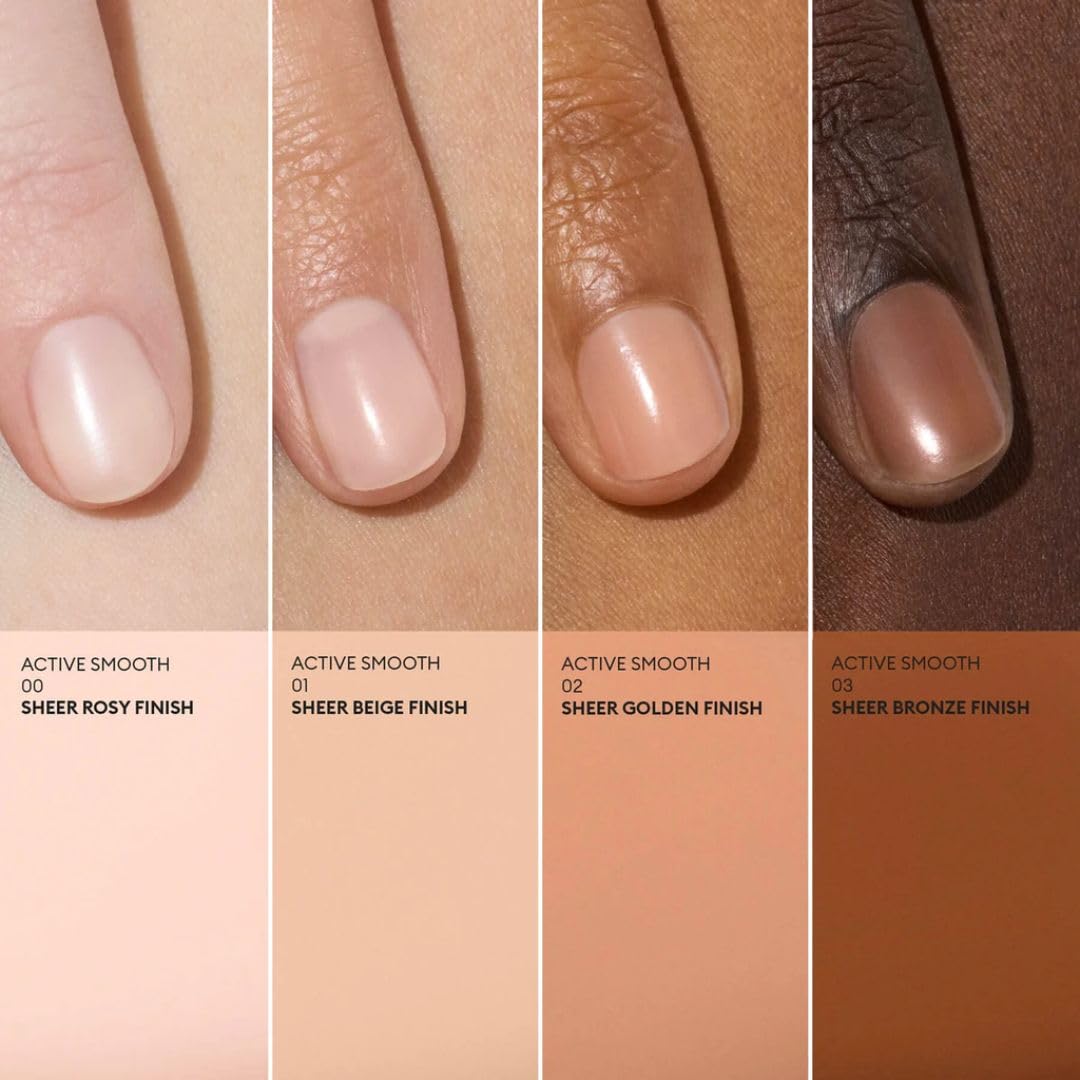 Hands at desk wearing polish demonstrating Manucurist everyday natural look