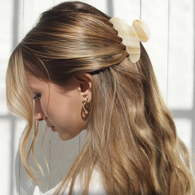 MAORULU used in half-up hairstyle showing secure everyday hold