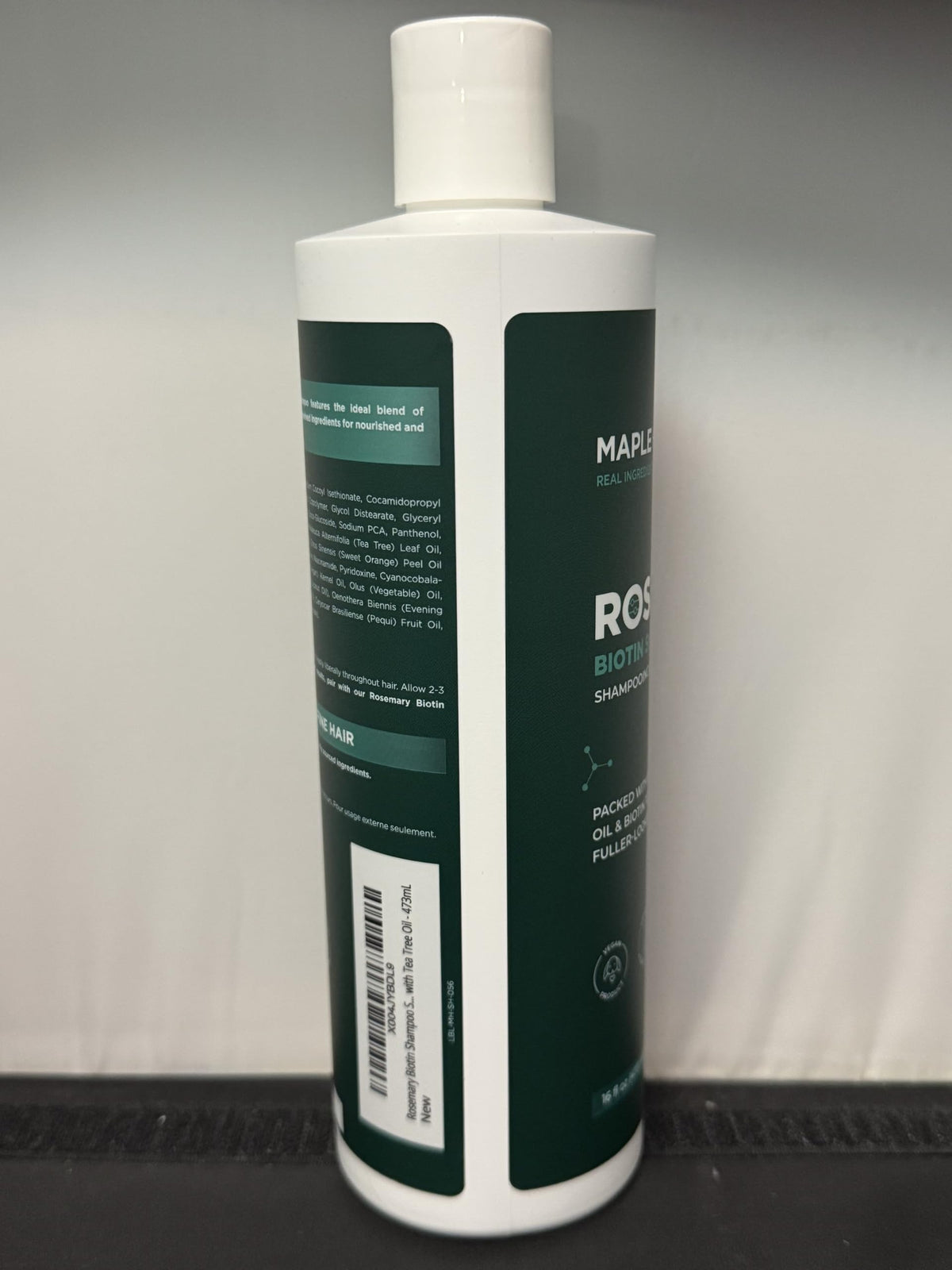 Maple Holistics bottle on bathroom shelf styled for everyday routine appeal