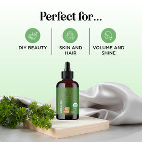 Maple Holistics amla oil pouring texture showing lightweight absorption benefit