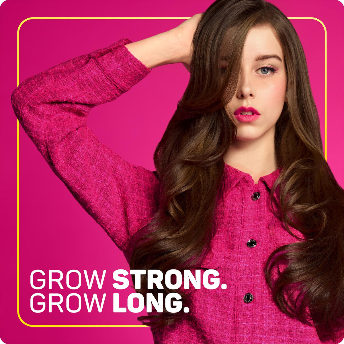 Marc Anthony on curly-haired model showing anti-frizz, smoother styling benefit
