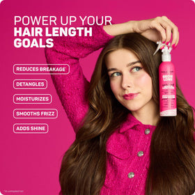 Marc Anthony spray in hand applied to damp hair for faster detangling