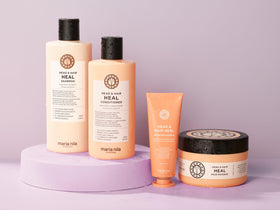 Maria Nila conditioner texture on hand demonstrating creamy moisturizing feel