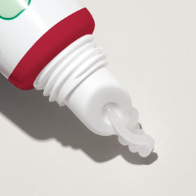 Mario Badescu application on fingers showing easy squeeze tube usage