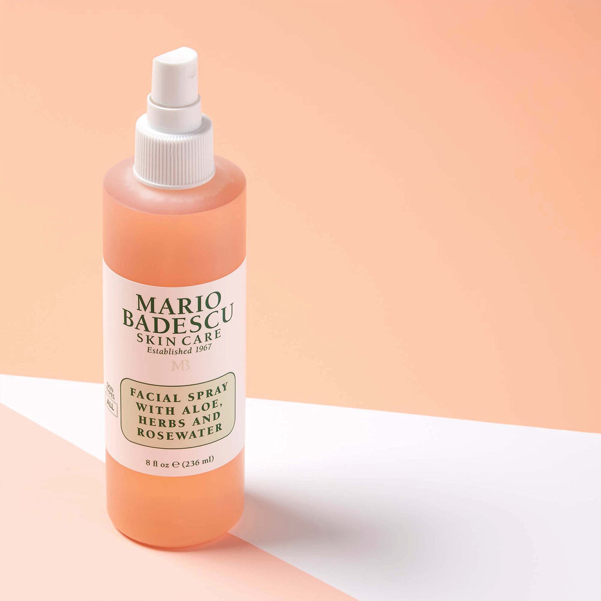 Mario Badescu bottle in bathroom setting for daily skincare convenience