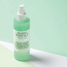Mario Badescu bottle in bathroom routine staged with towel to show daily-use convenience